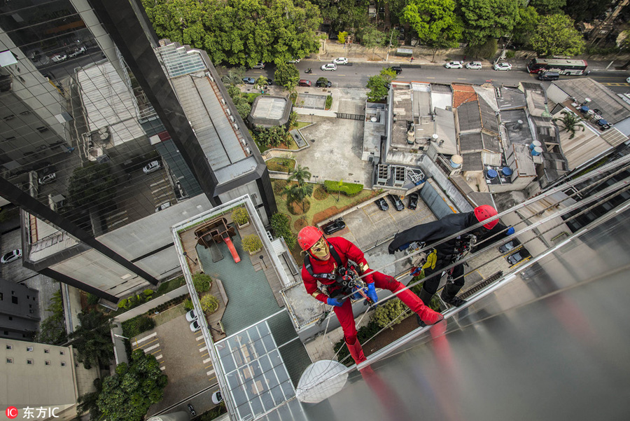 Superheroes make surprise visit to Brazil's children's hospital