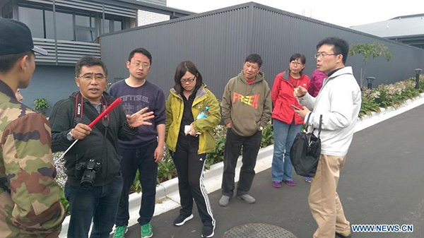 Six Chinese tourists airlifted out of quake-hit town