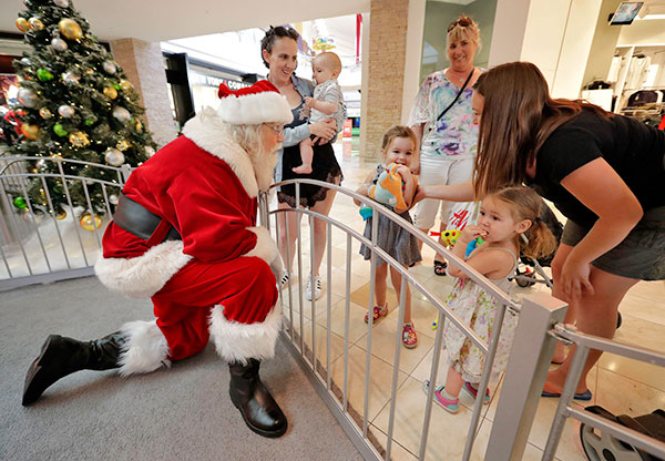 Malls take more modern approach to Santa visits