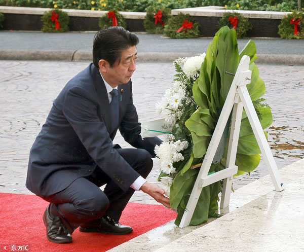 Abe pays respects at Hawaii memorials