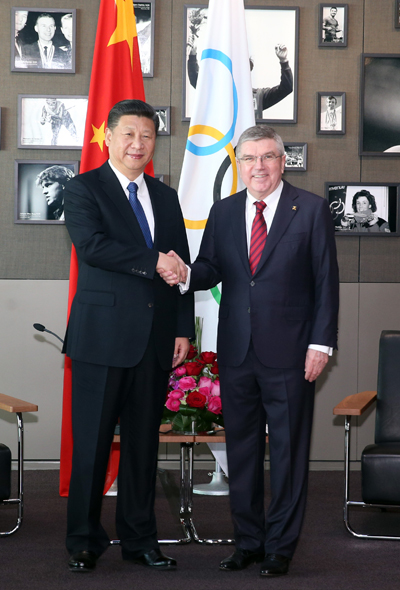 Xi promises green and corruption-free Beijing Winter Olympics on visit to IOC
