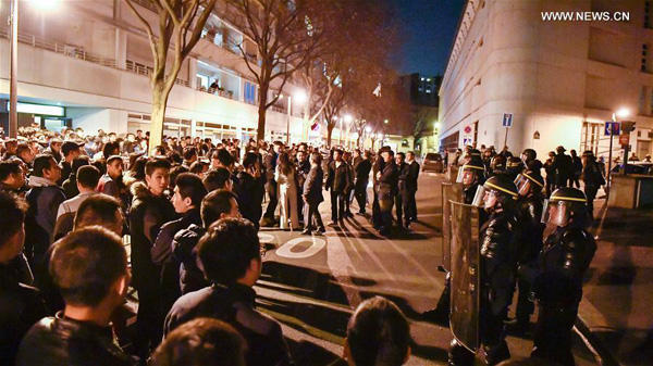 Chinese community holds protest in Paris against death of one Chinese national