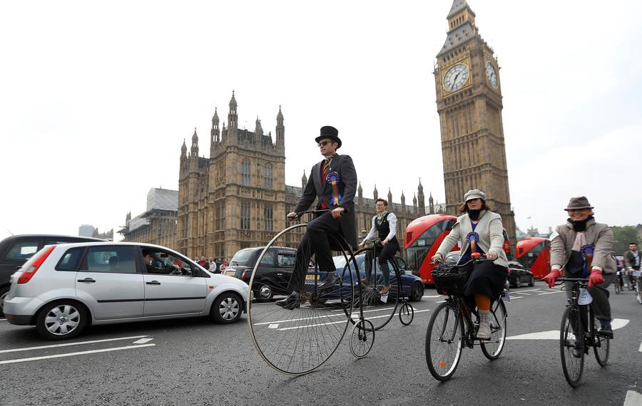 Hundreds of cyclists ride through The Tweed Run in London