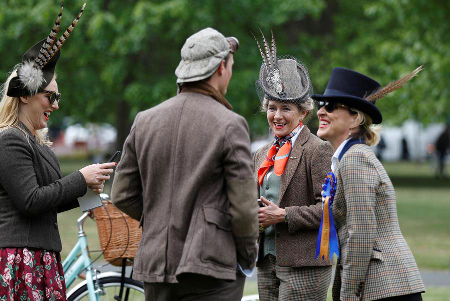 Hundreds of cyclists ride through The Tweed Run in London