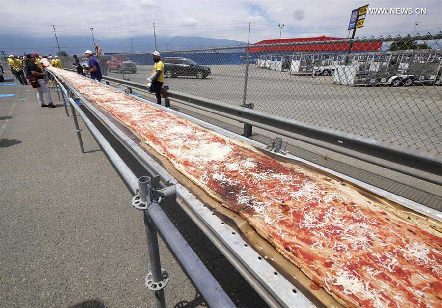 World's longest pizza breaks Guinness Records in US