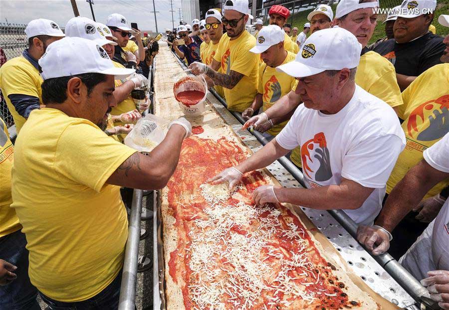 World's longest pizza breaks Guinness Records in US