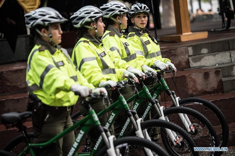 China donates bicycles for local police patrols in Santiago, Chile