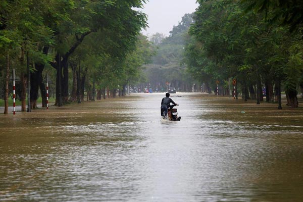 Death toll from Vietnam storm tops 60 and dams near bursting