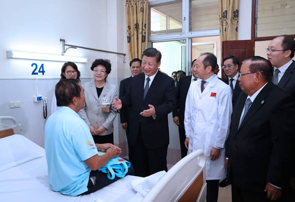 Xi calls for more China-Laos cooperation in public welfare