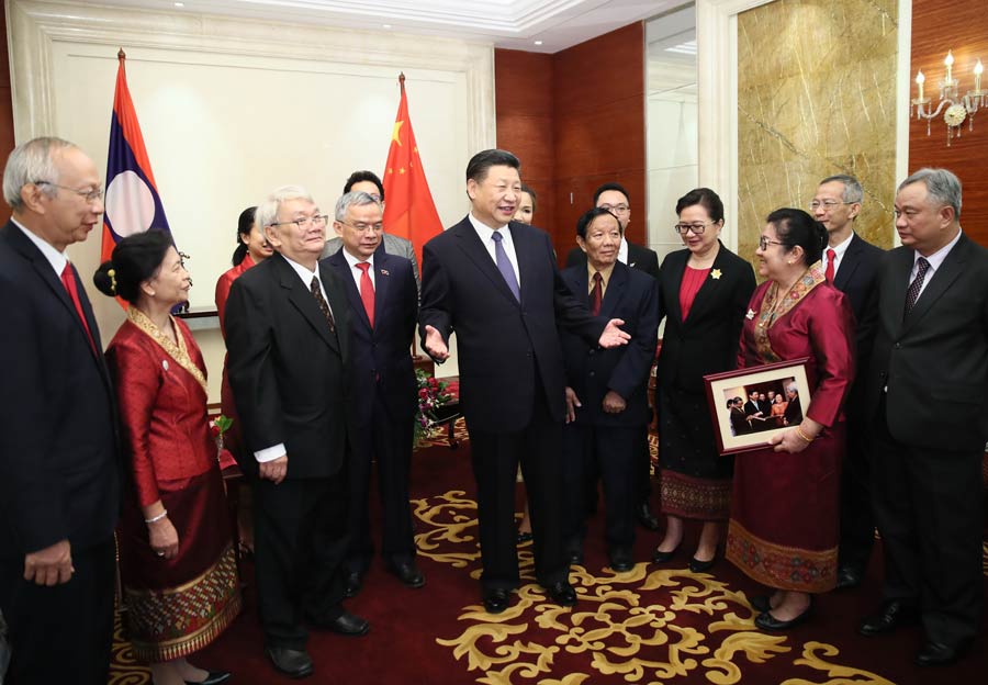 President visits with longtime Laotian friends