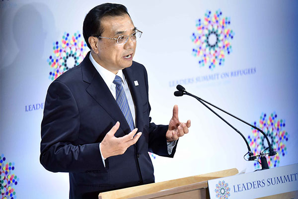 Premier Li attends summit for refugees and migrants