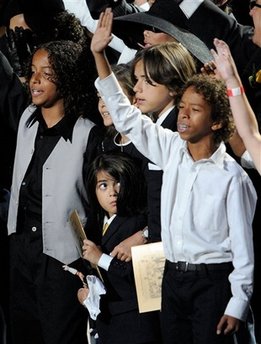 Jackson's kids emerge from behind the veil