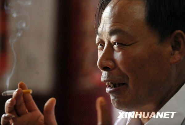 严宏昌：一个“手印农民”的60载土地深情